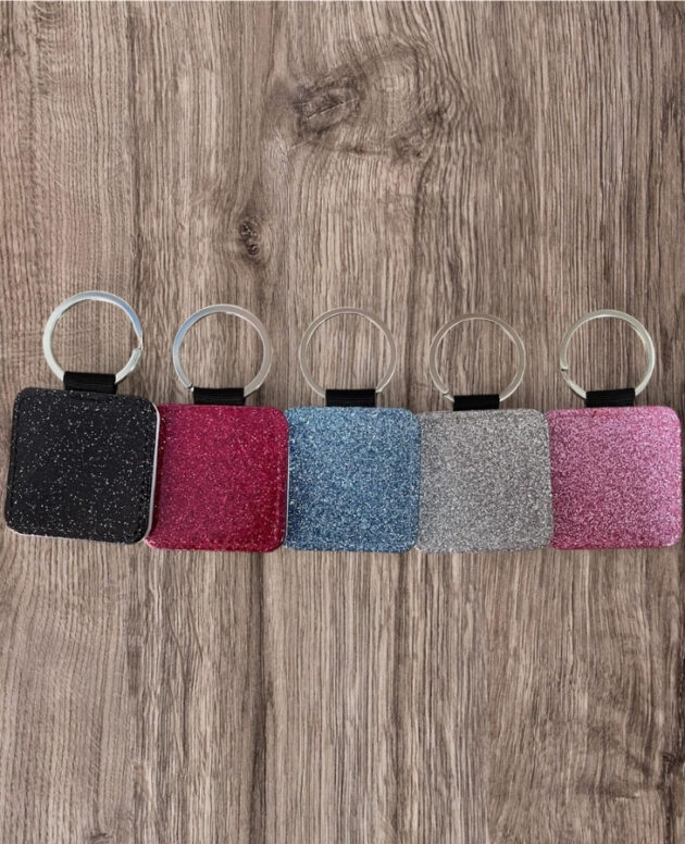 Llaveros de polipiel con reverso de purpurina